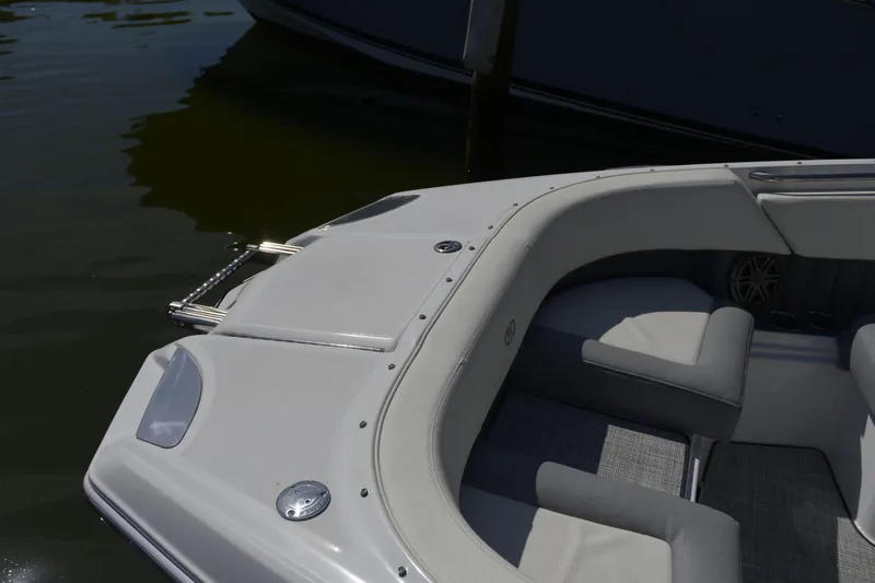 Slide: The Image of 2020 Cobalt 23SC boat bow with seating and stainless steel ladder. - 14