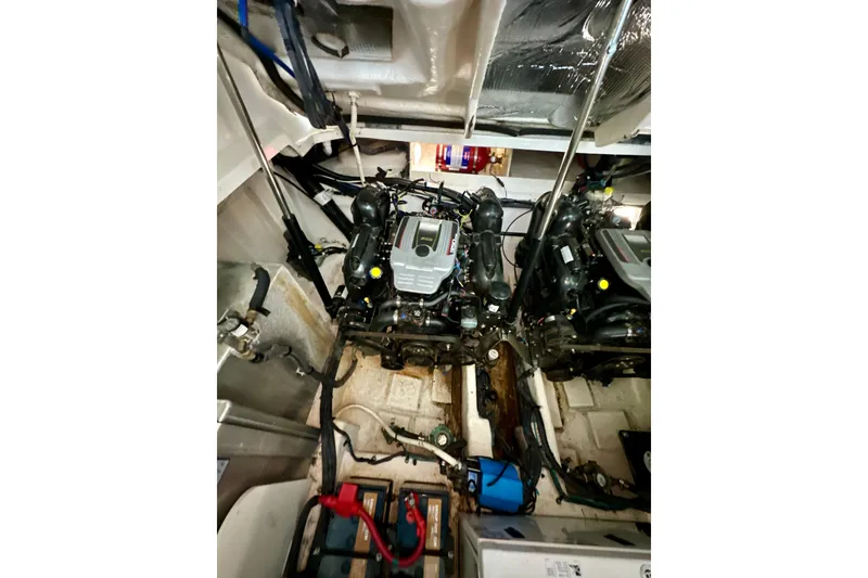 Slide: The Image of Engine room of 2012 Sea Ray 330 Sundancer with dual engines and equipment. - 18