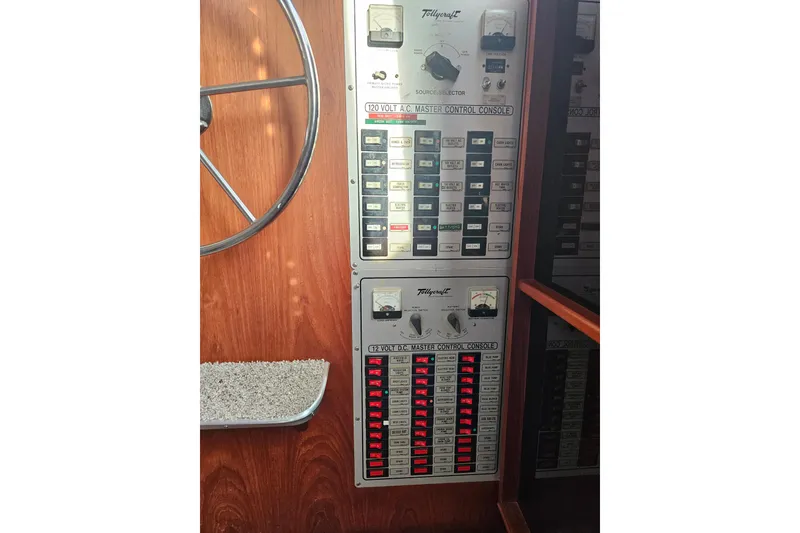 Slide: The Image of Control panel of a 1981 Tollycraft 43 Motor Yacht with switches and gauges. - 25
