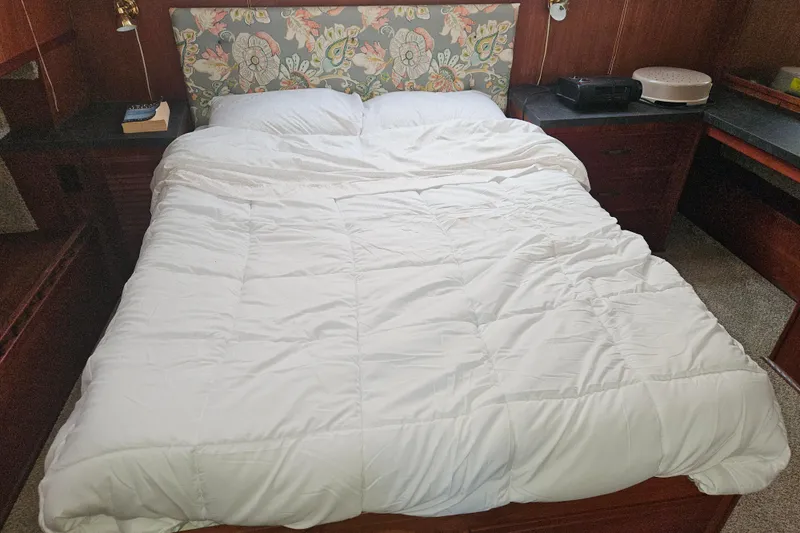 Slide: The Image of Cozy bedroom with floral headboard in 1981 Tollycraft 43 Motor Yacht. - 27