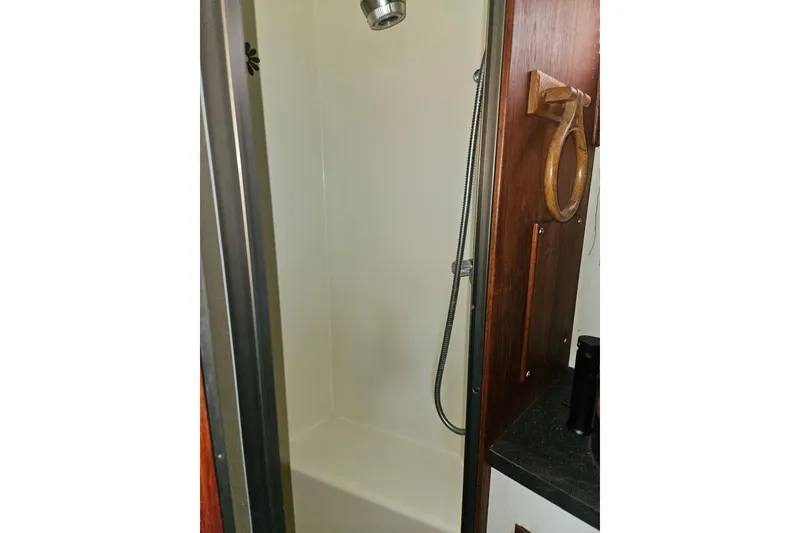 Slide: The Image of Shower area in 1981 Tollycraft 43 Motor Yacht with wooden accents. - 35
