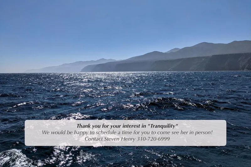 Slide: The Image of Ocean view with mountains, promoting 2003 Tiara Yachts 4000 Express "Tranquility" for sale. Contact Steven Henry. - 35