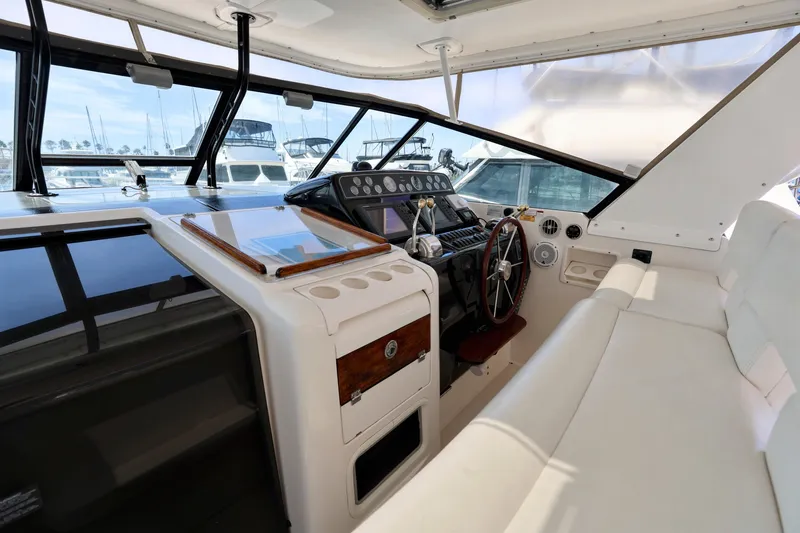 Slide: The Image of Interior of 2003 Tiara 4000 EXPRESS yacht with helm and seating area. - 8