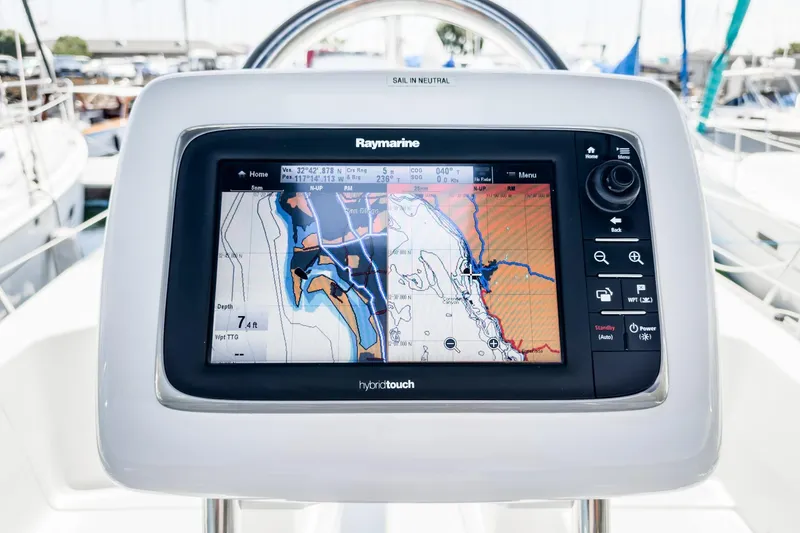 Slide: The Image of Raymarine navigation system on 2015 Hunter 33 sailboat, displaying nautical chart. - 7
