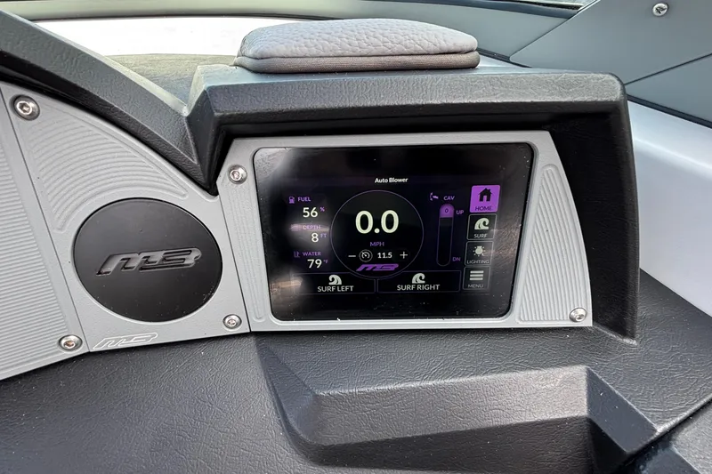 Slide: The Image of Dashboard of 2026 MB B52 23 Alpha boat with digital display and controls. - 12