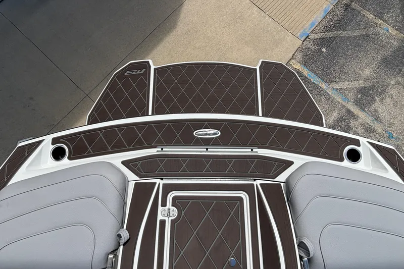 Slide: The Image of 2026 MB B52 23 Alpha boat deck with brown diamond-patterned flooring. - 18