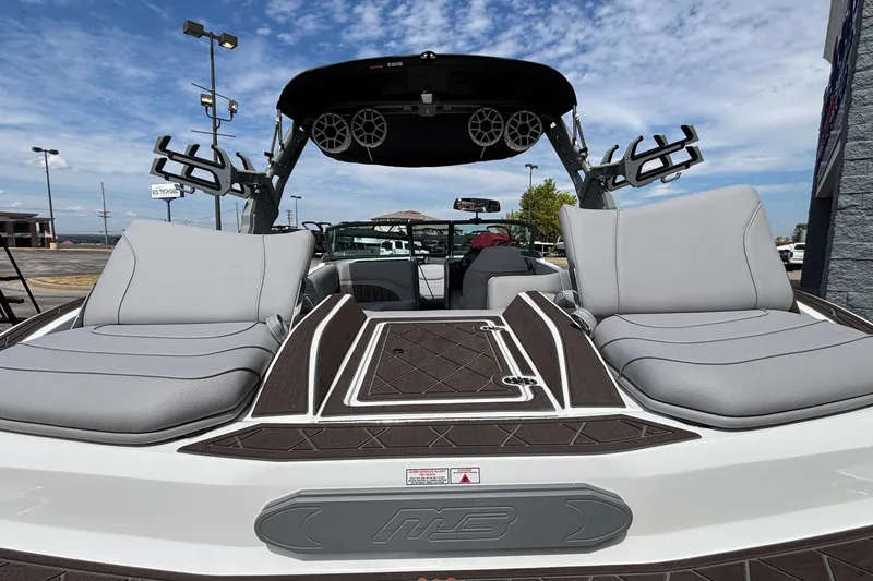 Slide: The Image of 2026 MB B52 23 Alpha boat interior with gray seating and modern design. - 20