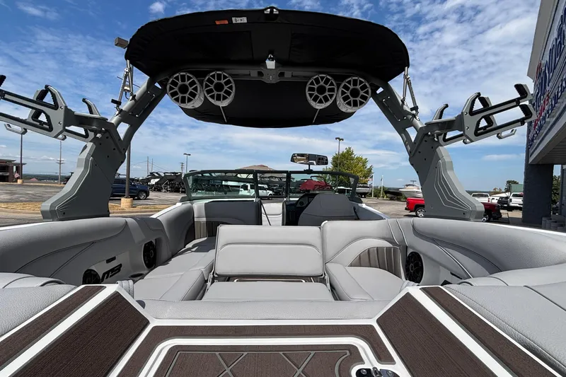 Slide: The Image of 2026 MB B52 23 Alpha boat interior with sleek seating and advanced audio system. - 25