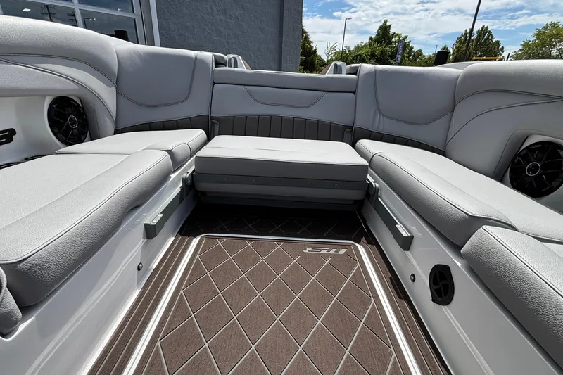 Slide: The Image of Luxurious interior of 2026 MB B52 23 Alpha boat with gray seating and stylish flooring. - 6