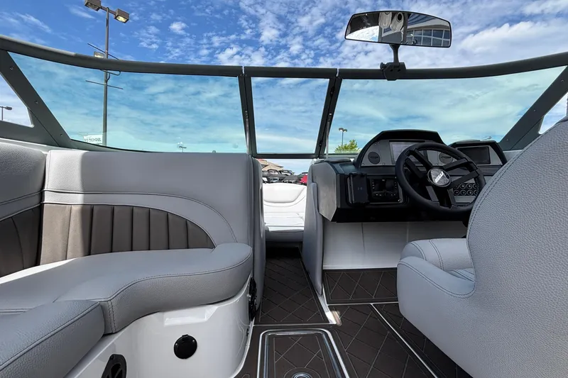 Slide: The Image of Interior of 2026 MB B52 23 Alpha boat with modern dashboard and seating. - 9