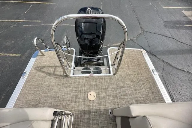 Slide: The Image of 2020 Harris Solstice 250 boat deck with motor and railing, viewed from above. - 15