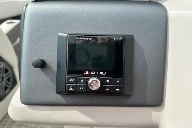 Slide: The Image of JL Audio MediaMaster 50 on 2020 Harris Solstice 250 boat dashboard. - 20