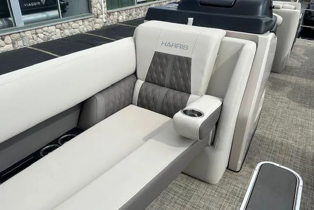 Slide: The Image of 2020 Harris Solstice 250 boat interior with luxurious seating and cup holder. - 25