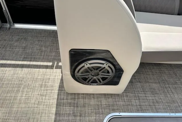 Slide: The Image of Speaker installed on a 2020 Harris Solstice 250 boat with textured flooring. - 32