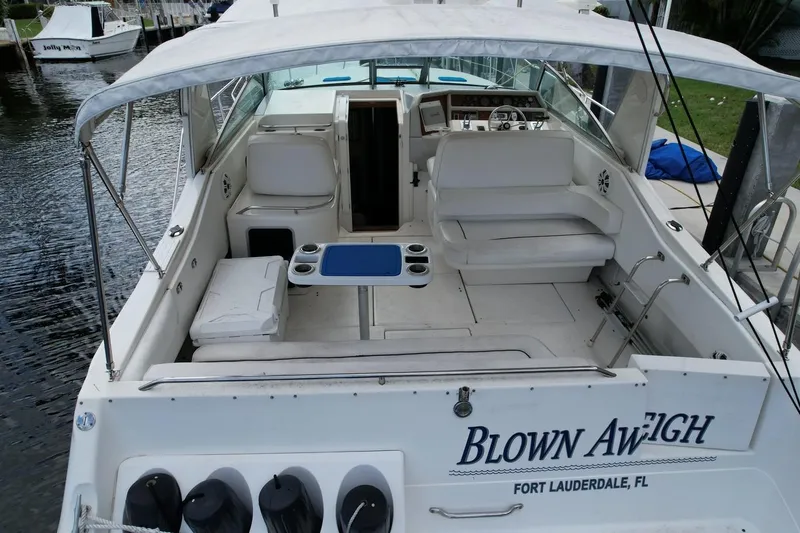 Slide: The Image of 1994 Sea Ray 370 Express Cruiser with spacious cockpit, docked in Fort Lauderdale, FL. - 45