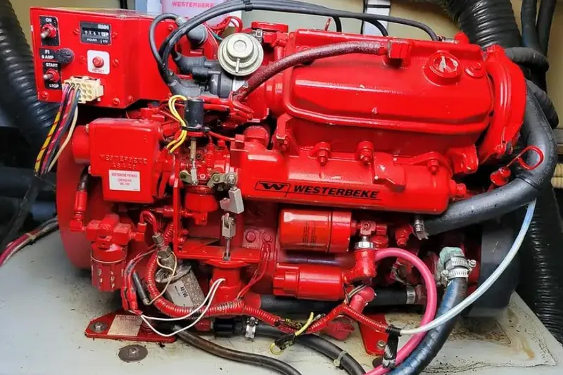 Slide: The Image of Red Westerbeke engine in a 1994 Sea Ray 370 Express Cruiser boat. - 55