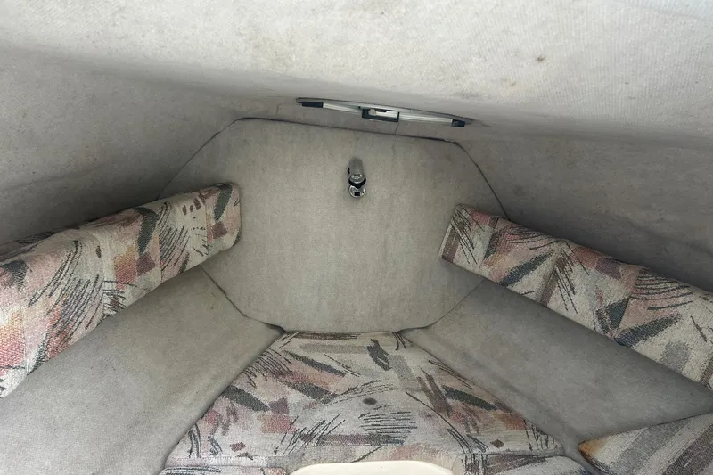 Slide: The Image of Interior cabin of 2001 Sea Fox 204 Millenium boat with patterned cushions. - 11