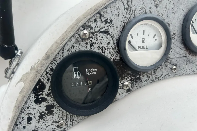 Slide: The Image of Close-up of 2001 Sea Fox 204 Millenium dashboard showing engine hours and fuel gauge. - 8