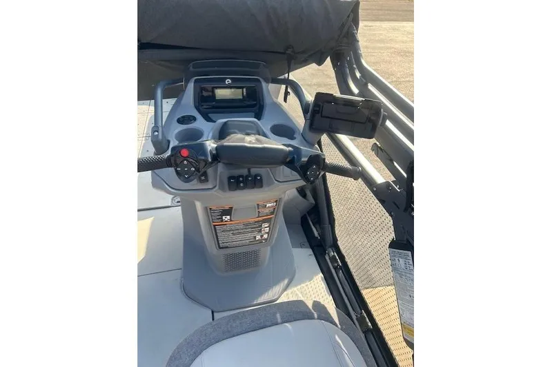 Slide: The Image of 2023 Sea Doo Switch dashboard with steering controls and display screen. - 10