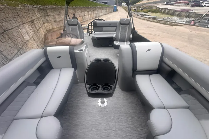 Slide: The Image of 2026 Starcraft EXS 3 Q DH pontoon boat interior with luxurious seating and modern design. - 7