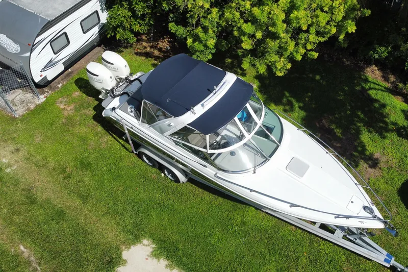 Slide: The Image of Aerial view of 2005 Formula 280 Sun Sport boat on trailer beside camper. - 20