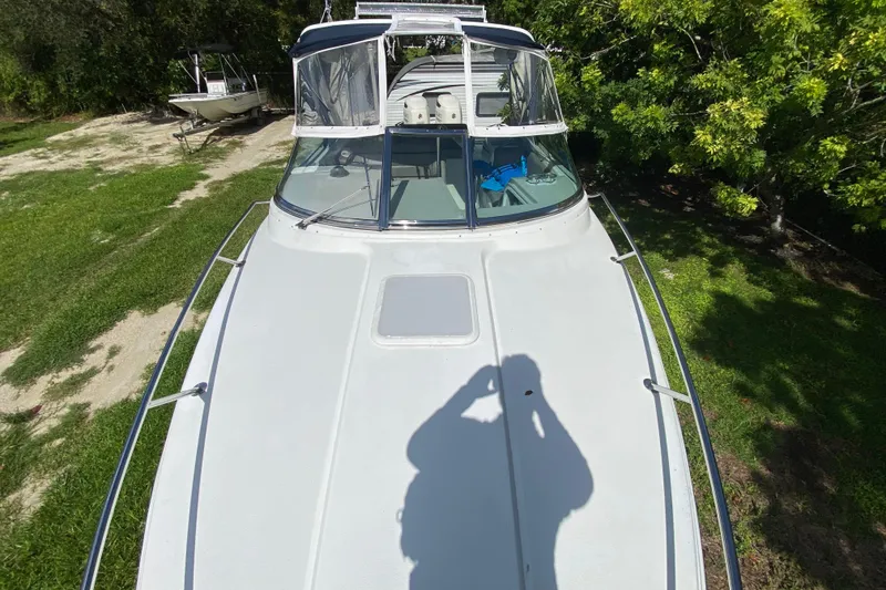 Slide: The Image of 2005 Formula 280 Sun Sport boat on grass, viewed from above. - 25