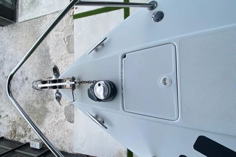 Slide: The Image of 2005 Formula 330 Sun Sport boat bow with anchor and deck details. - 13