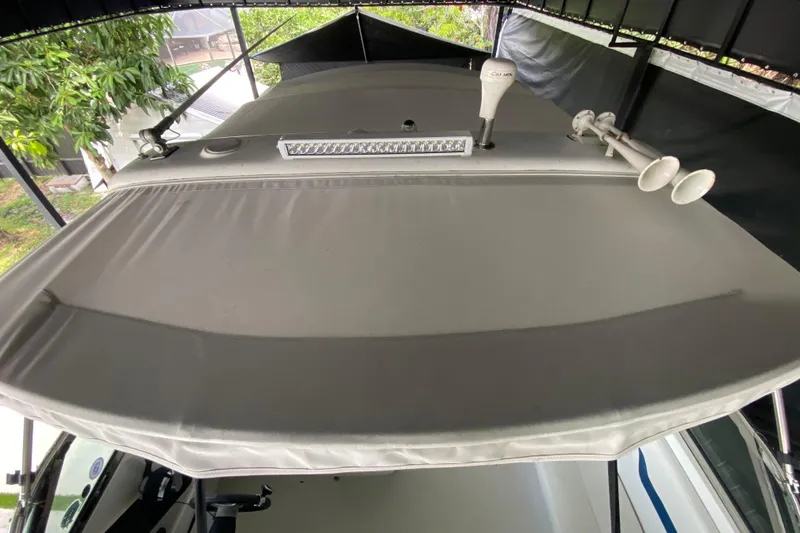 Slide: The Image of 2005 Formula 330 Sun Sport boat roof with canopy and equipment under shelter. - 26