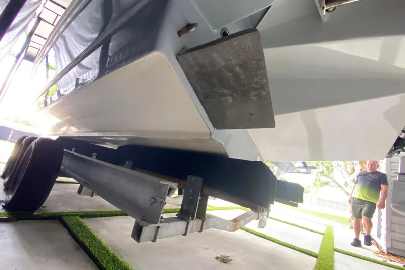 Slide: The Image of 2005 Formula 330 Sun Sport boat on trailer, viewed from below. - 33