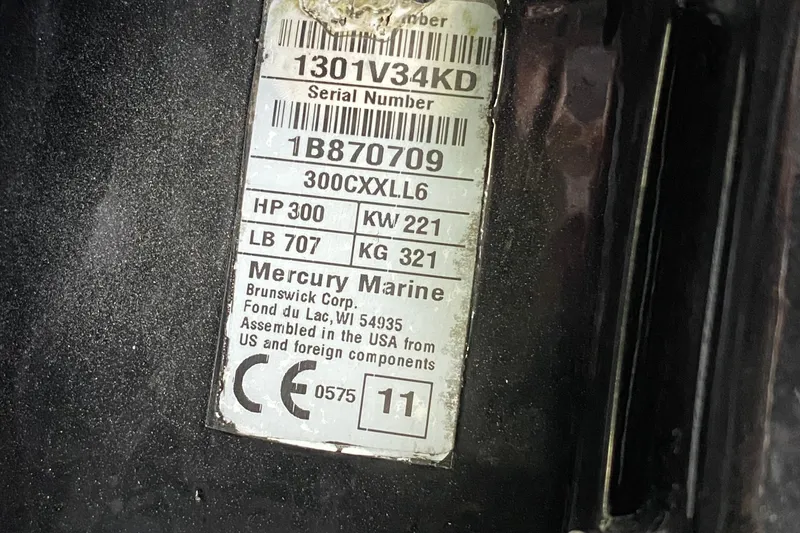 Slide: The Image of Label on Mercury Marine engine, showing serial number and specifications for Formula 330 Sun Sport, 2005. - 38