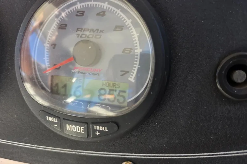 Slide: The Image of Close-up of a 2003 Boston Whaler 255 Conquest tachometer displaying 855 hours. - 22