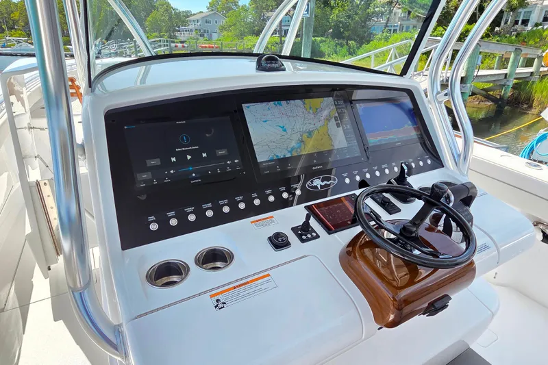 Slide: The Image of 2025 Valhalla Boatworks V-41 helm with advanced navigation and control systems. - 13