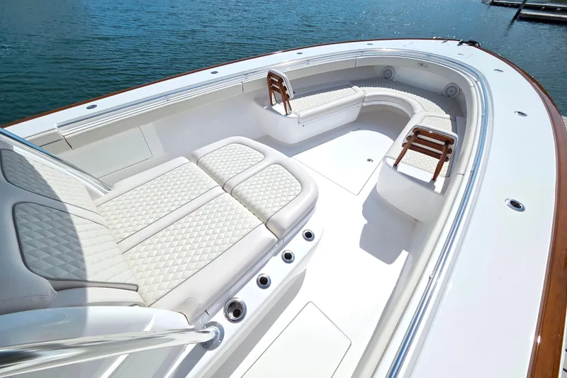 Slide: The Image of Luxurious 2025 Valhalla Boatworks V-41 with elegant seating and sleek design on the water. - 2