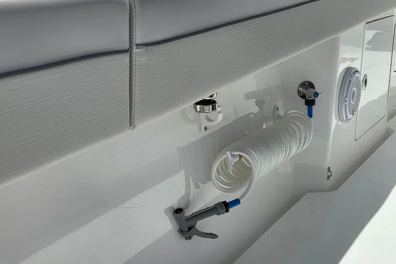 Slide: The Image of 2025 Valhalla Boatworks V-41 deck with coiled hose and speaker detail. - 21