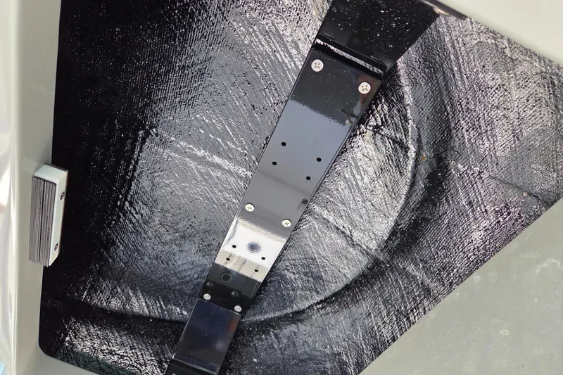 Slide: The Image of Underside view of 2025 Valhalla Boatworks V-41 hull with black textured surface. - 26