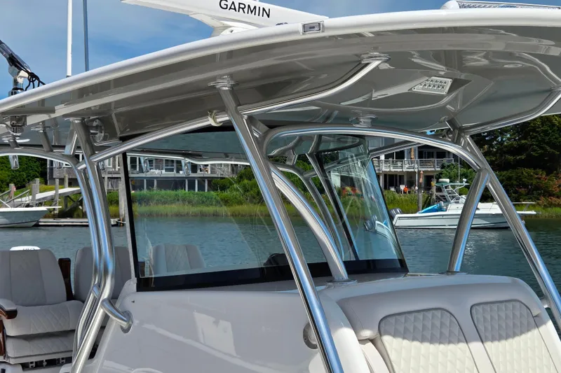 Slide: The Image of 2025 Valhalla Boatworks V-41 with sleek design and modern features on a calm waterway. - 30