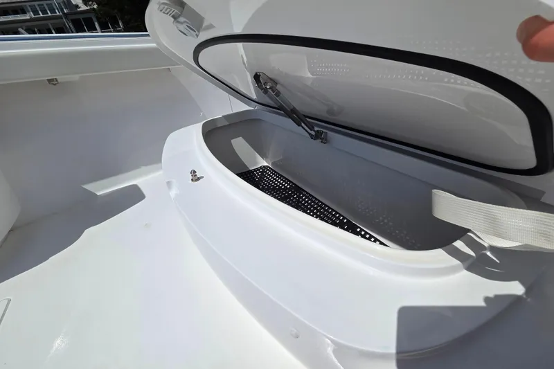 Slide: The Image of Open storage compartment on 2025 Valhalla Boatworks V-41, showcasing interior design. - 6