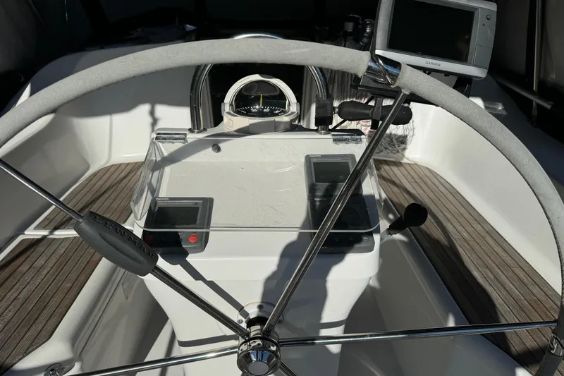 Slide: The Image of Steering wheel and navigation equipment on 2002 Beneteau Oceanis 393 sailboat. - 19