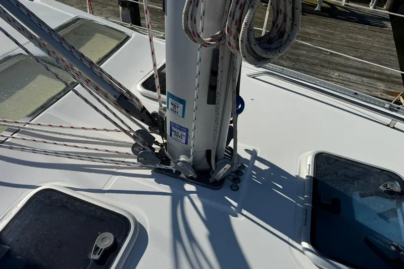 Slide: The Image of Deck view of 2002 Beneteau Oceanis 393 sailboat with rigging and hatches. - 21
