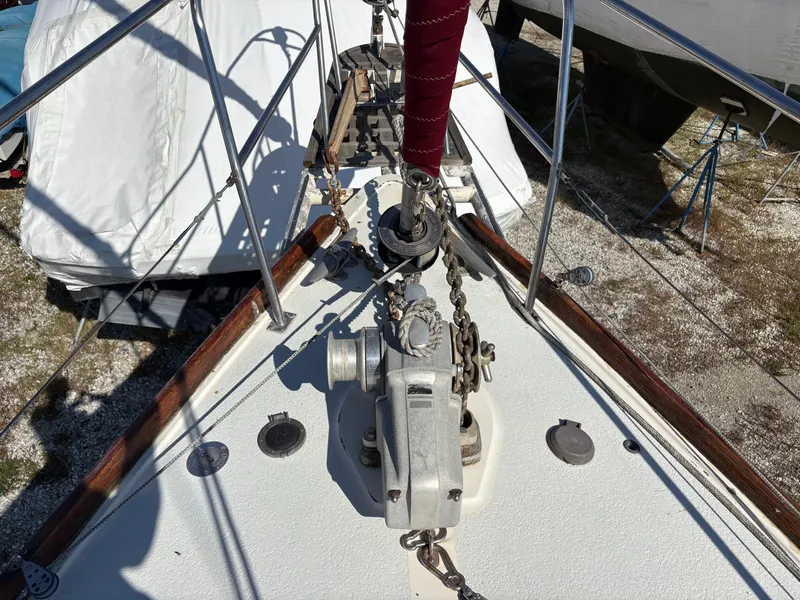 Slide: The Image of Bow of 1984 Irwin 41 sailboat with anchor chain and winch system. - 7