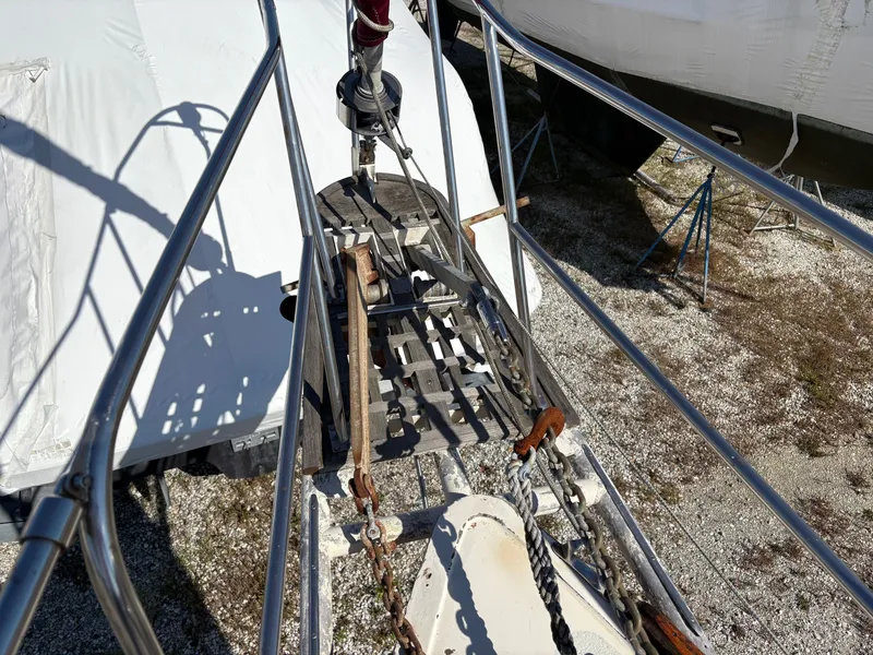 Slide: The Image of Bow of 1984 Irwin 41 sailboat with anchor chain and deck details. - 8