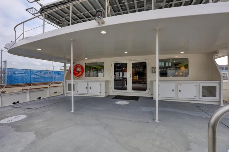 Slide: The Image of 2007 MetalCraft Catamaran deck with modern design and safety features. - 15