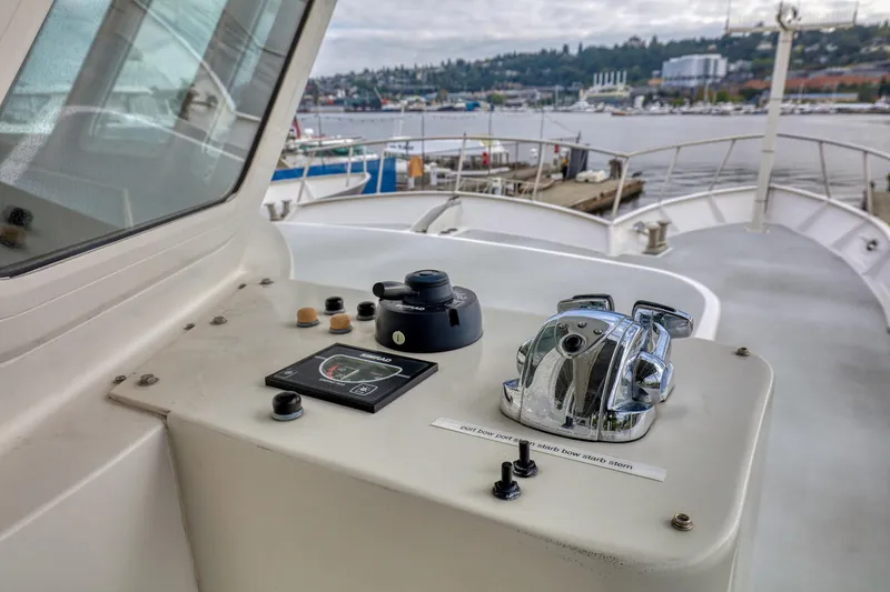 Slide: The Image of Control panel on a 2007 MetalCraft Catamaran with waterfront view. - 17