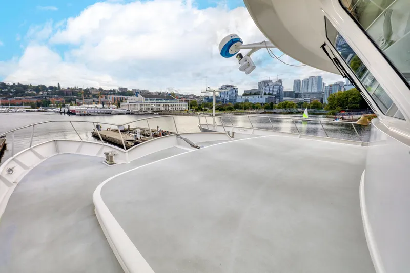 Slide: The Image of 2007 MetalCraft Catamaran docked with cityscape and waterfront view. - 18