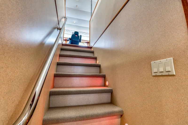 Slide: The Image of Staircase inside 2007 MetalCraft Catamaran with carpet and handrail, leading to upper deck. - 28