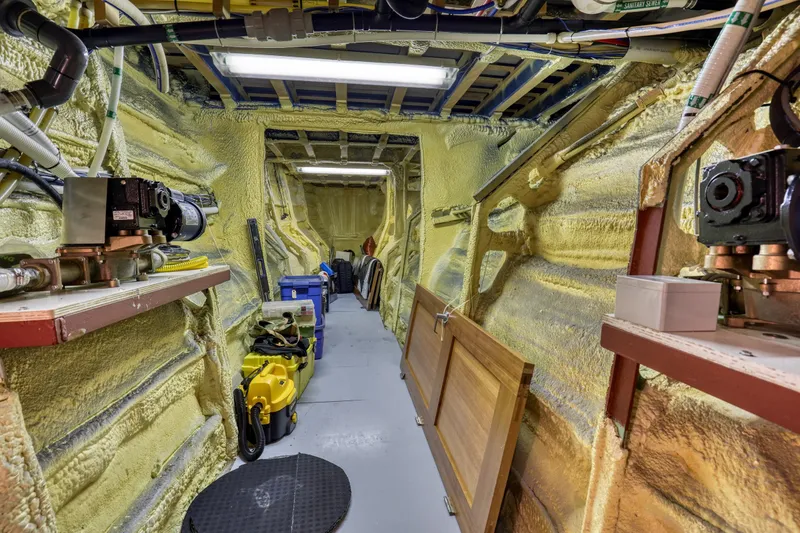 Slide: The Image of Interior of a 2007 MetalCraft Catamaran showing equipment and storage area. - 40