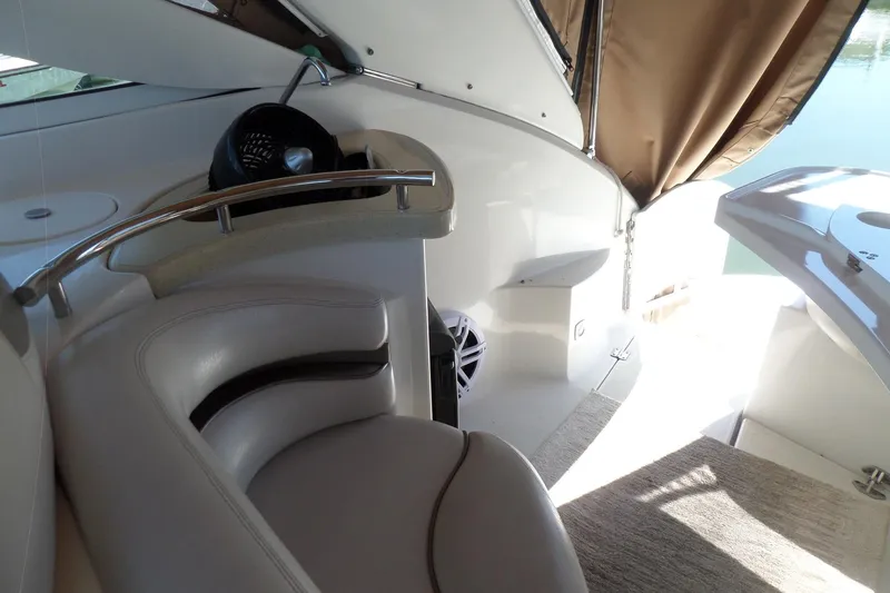 Slide: The Image of Interior of a 2003 Doral 280 SE boat with leather seating and modern design. - 11