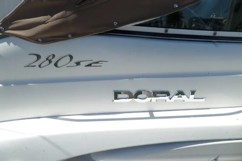 Slide: The Image of 2003 Doral 280 SE boat with logo and model name visible. - 4