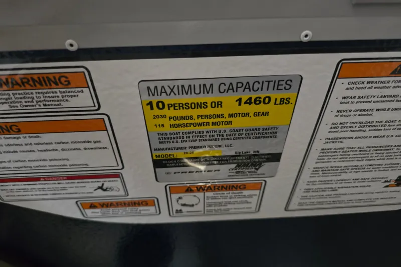 Slide: The Image of 2025 Premier 200 Sunscape boat interior with modern helm and comfortable seating. - 15