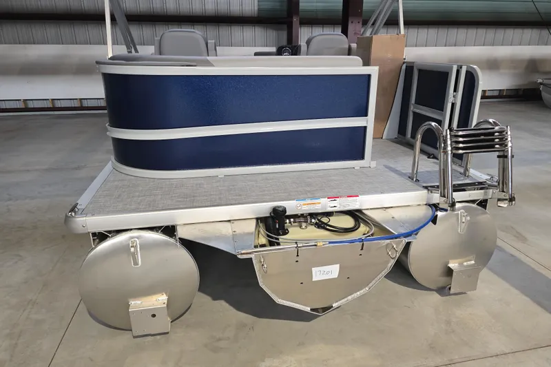 Slide: The Image of 2026 Premier 200 Sunscape pontoon boat parked outdoors on gravel, under clear blue sky. - 3